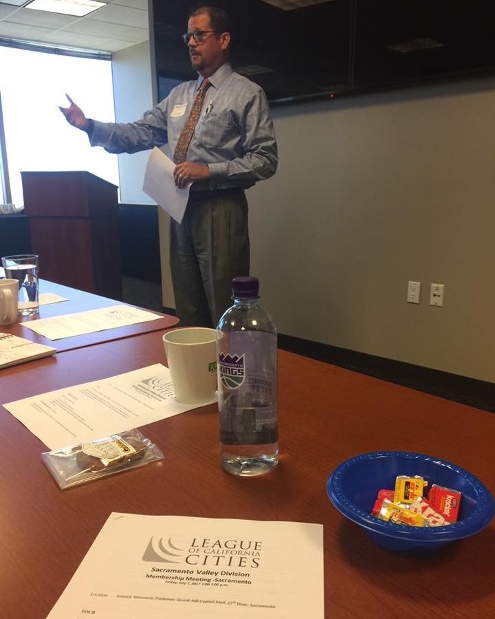 Speaker presenting at a League of California Cities Sacramento Valley Division membership meeting