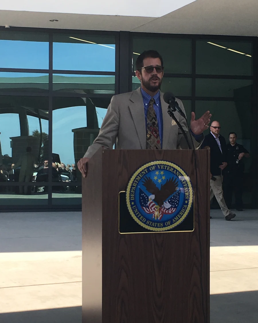 Randall Stone speaking at a Veterans Affairs facility event