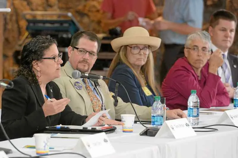 Randall Stone seated at a Chico candidate forum panel