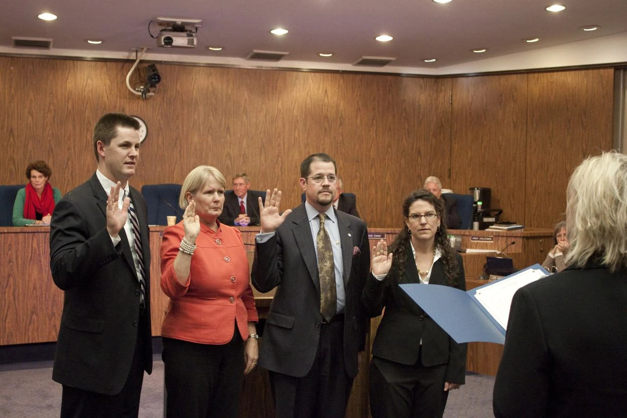 Chico City Council members taking an oath of office during a swearing-in ceremony