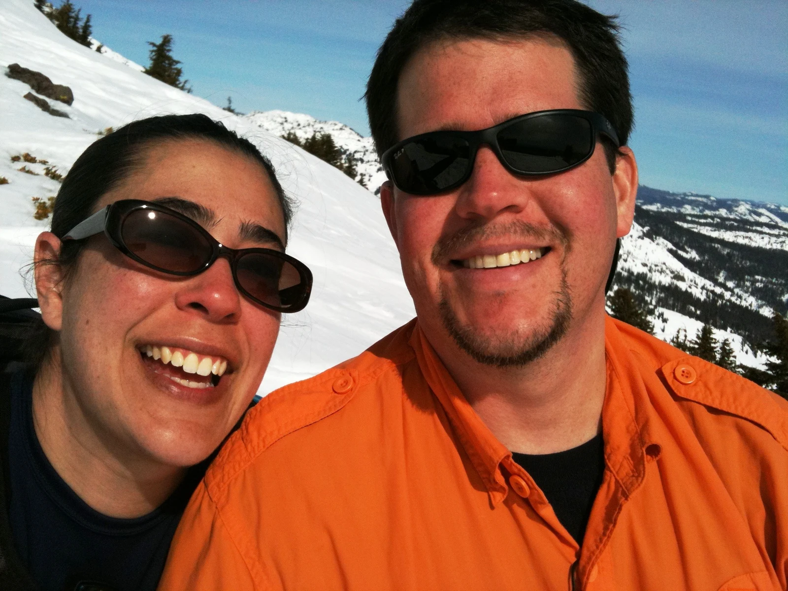 Krista and Randall Stone together in a snowy mountain setting