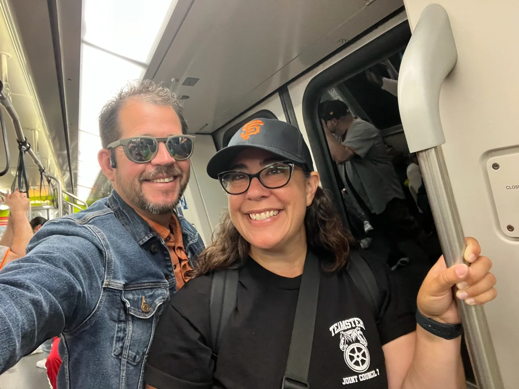 Krista and Randall Stone riding public transit