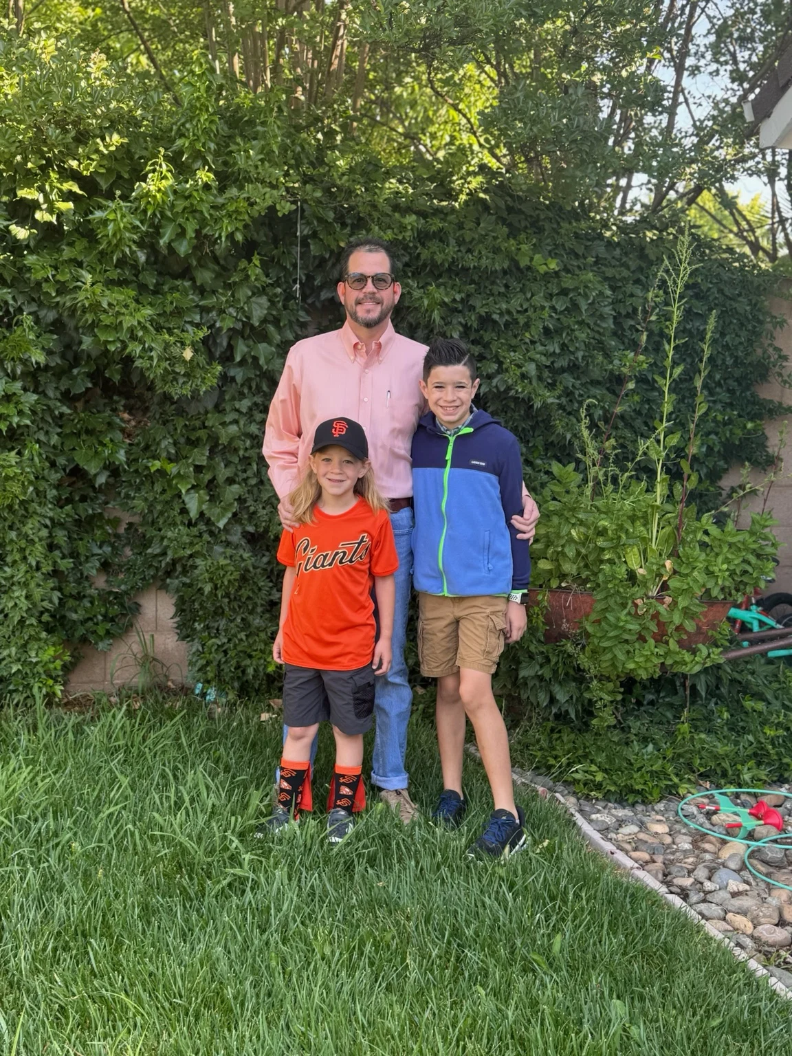 Randall Stone with his children outdoors