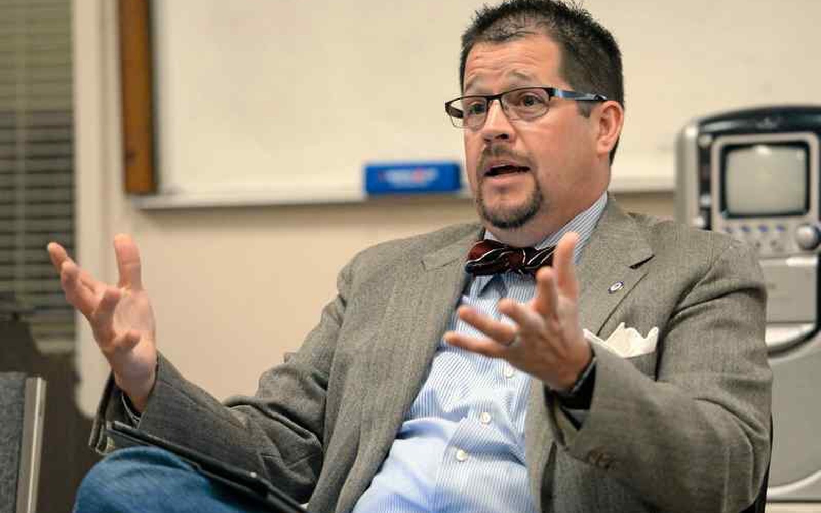 Seated interview during a professional or public-service discussion