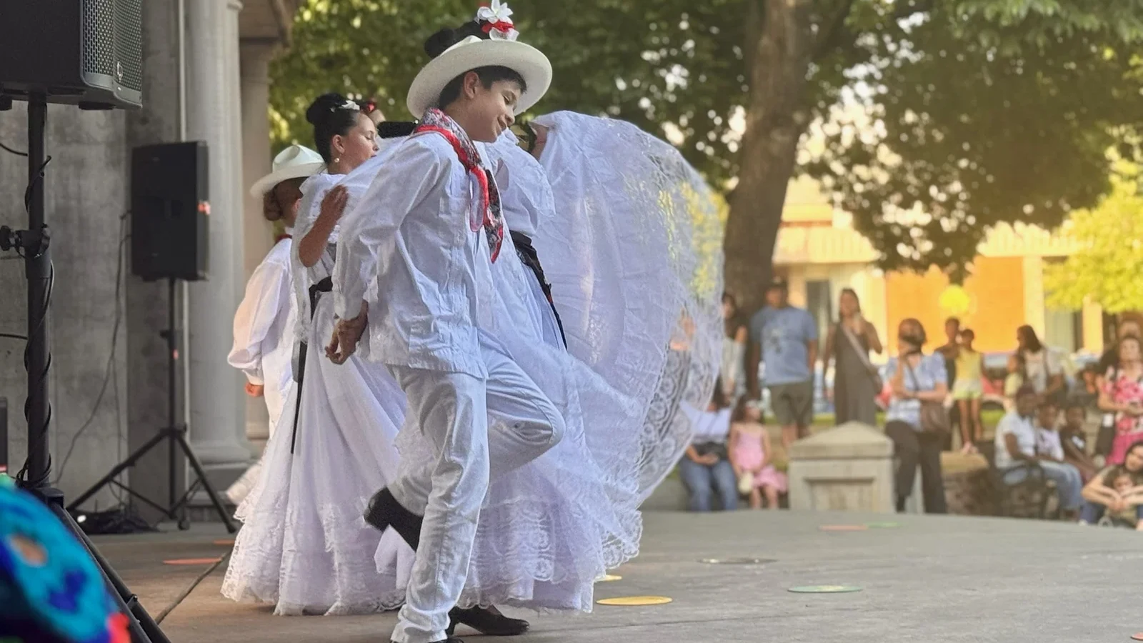 Rosas de María dancers in white performing in Chico